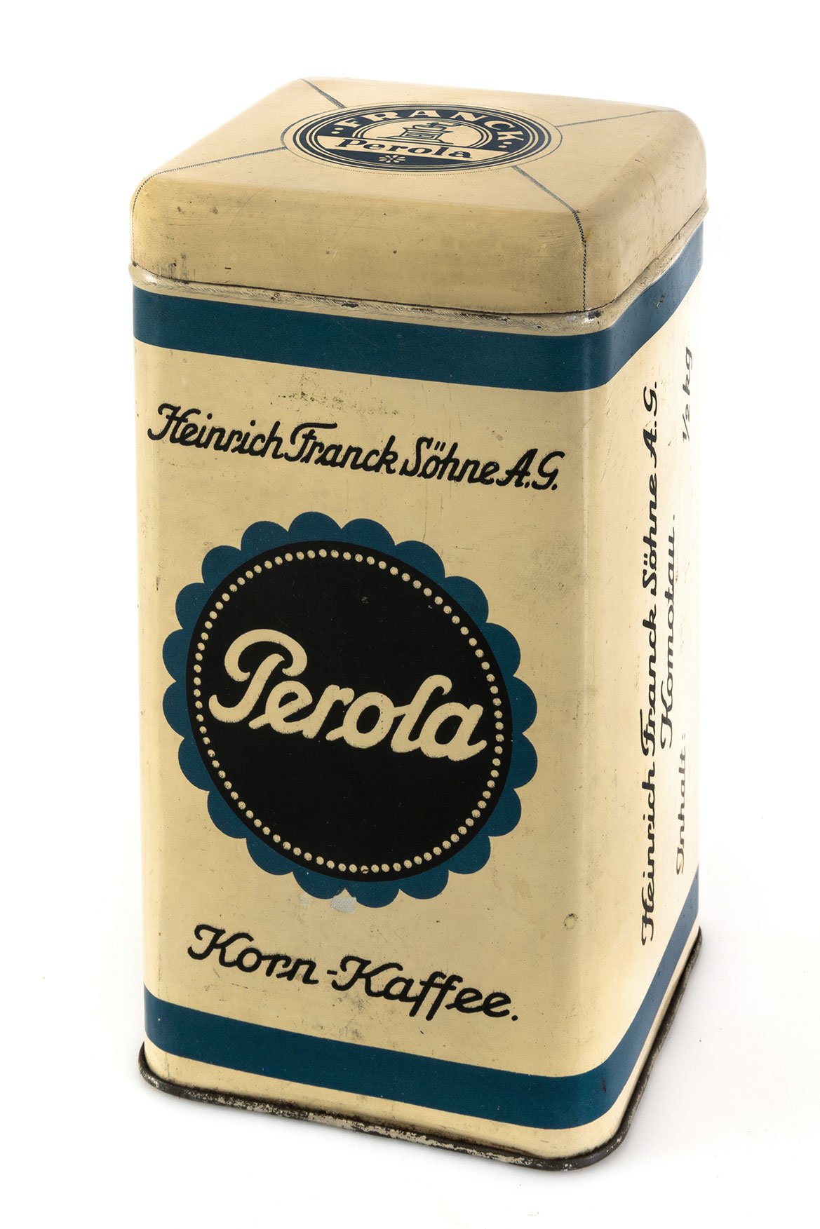 Perola, žitná káva v plechovce, produkt továrny v Chomutově, 2. čtvrtina 20. století